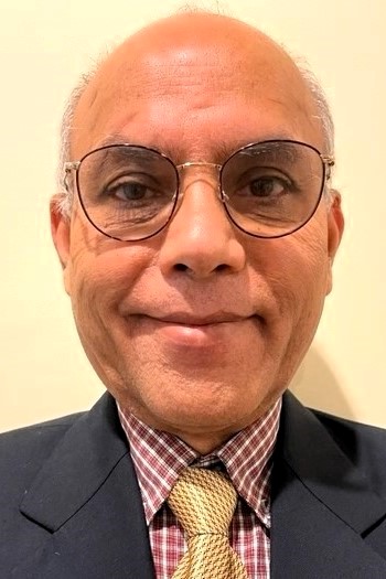 man smiling with glasses