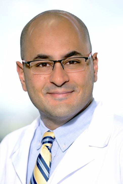 Man smiling with glasses
